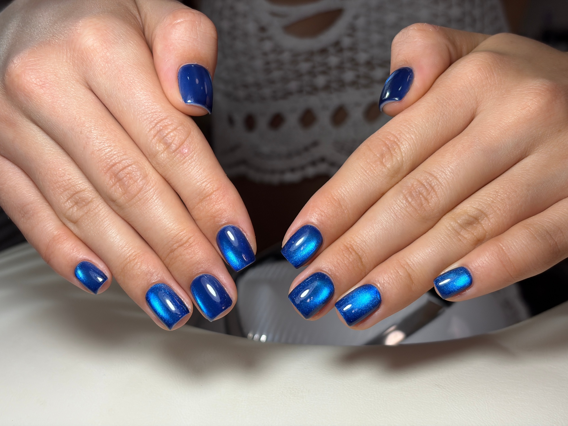 Glossy sapphire blue shimmer manicure
